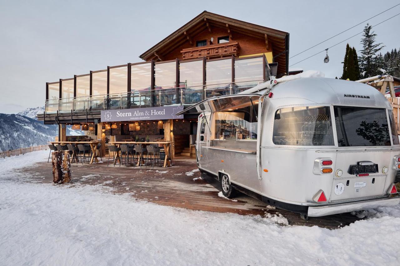 Alpendorf Hotel Stern Санкт Йохан им Понгау Екстериор снимка